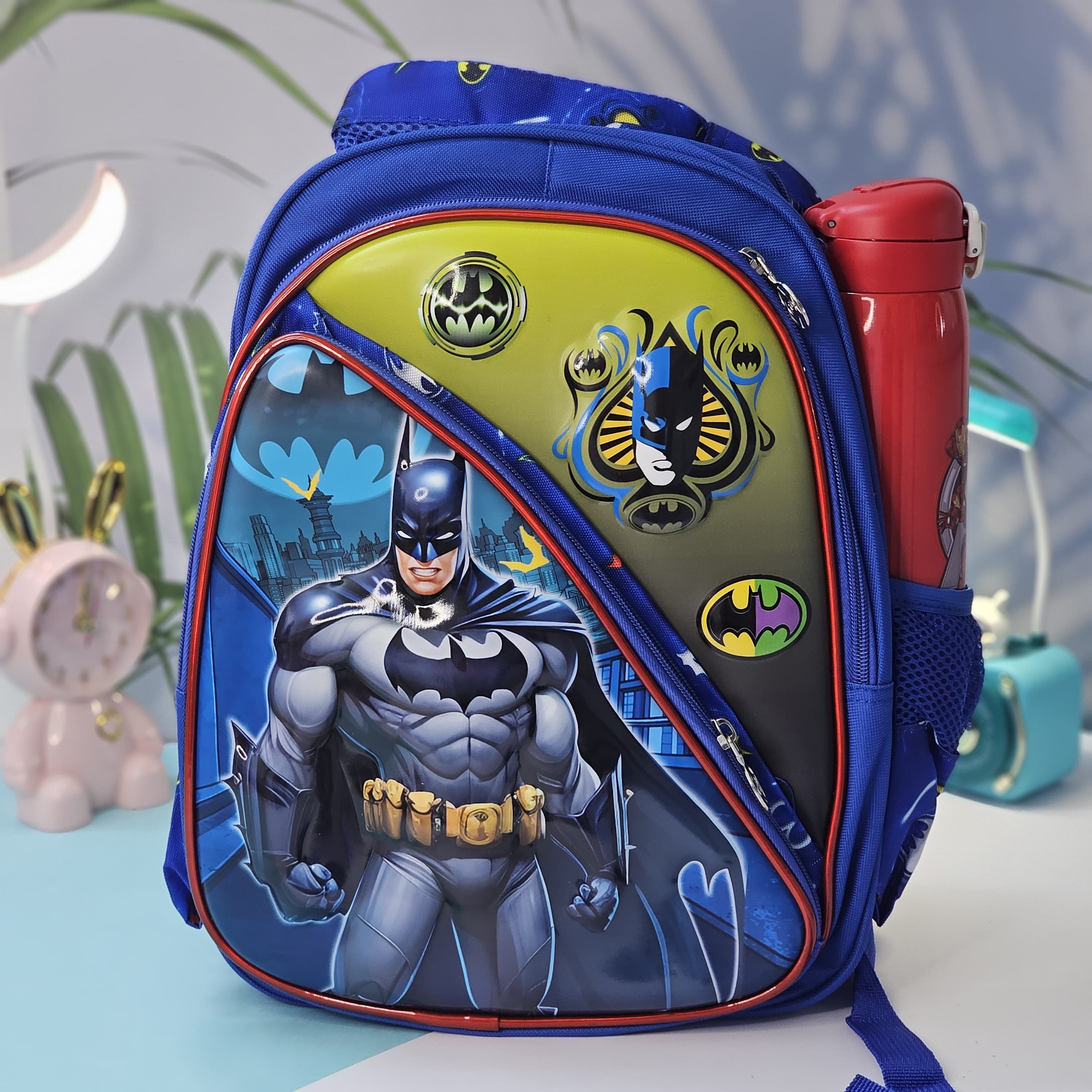 "Stylish and practical Usmile Toys backpack for boys, adorned with popular cartoon superhero characters, including Iron Man and Thor." www.usmile.toys